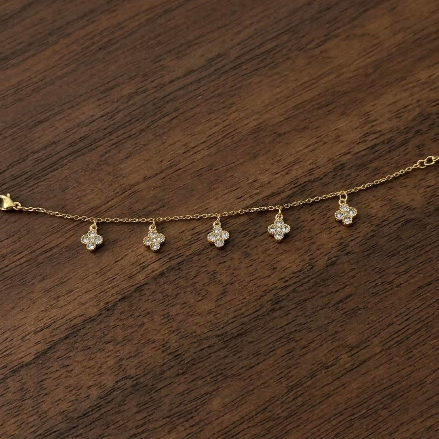 Bracelet charms trèfles en acier inoxydable doré Maison Bellano