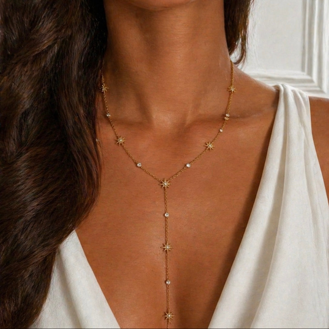 Collier fin forme Y en acier inoxydable doré avec pendentif étoile serti de zircons, Maison Bellano
